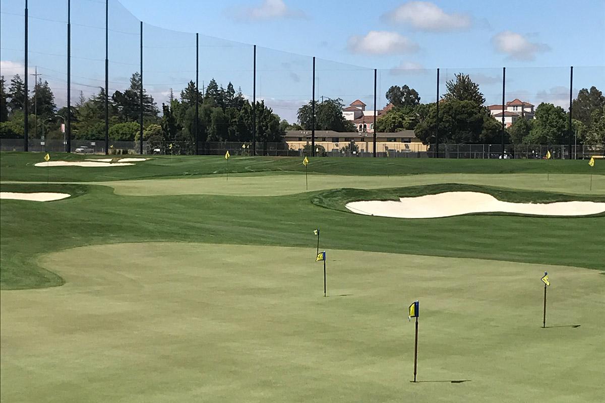 photo of short game area at Spartan Golf Complex, showing putting greens and chipping area